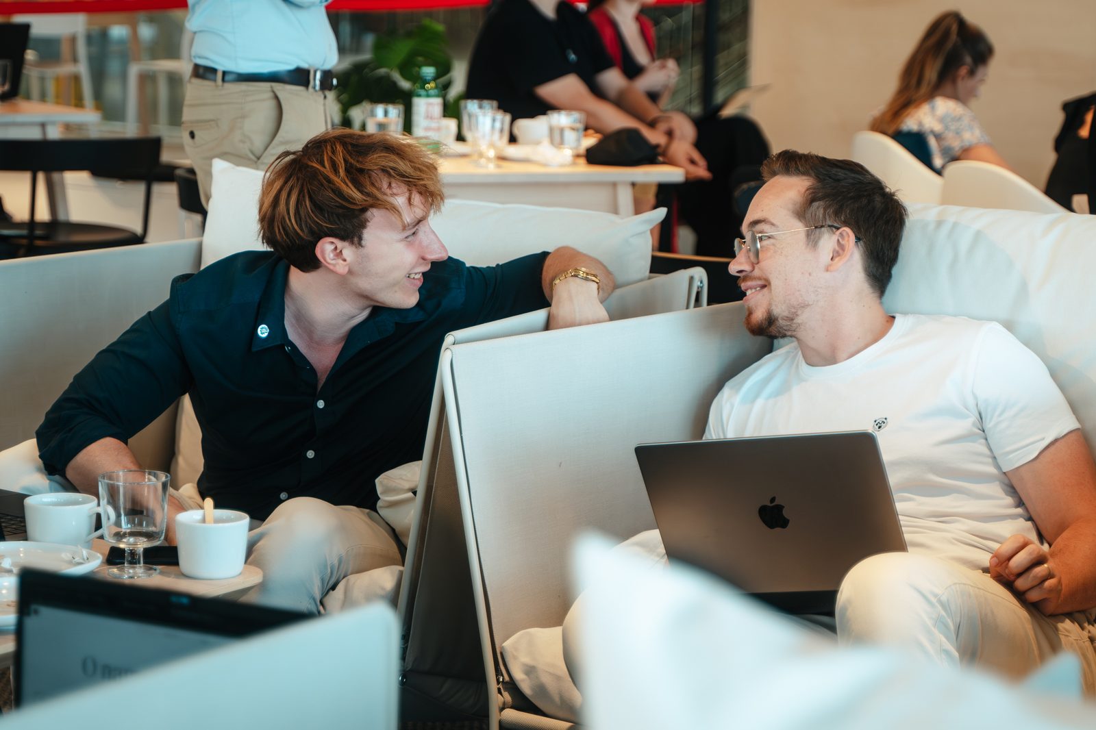 Shapers community members talking at an event